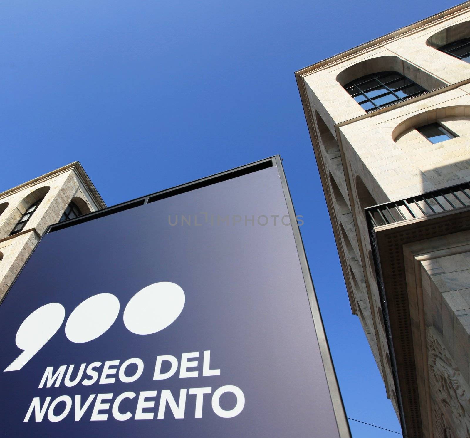 Entering the new Museo del Novecento, hosting Picasso, Cezanne, Fontana, Mondrian works of art in Milan, Italy