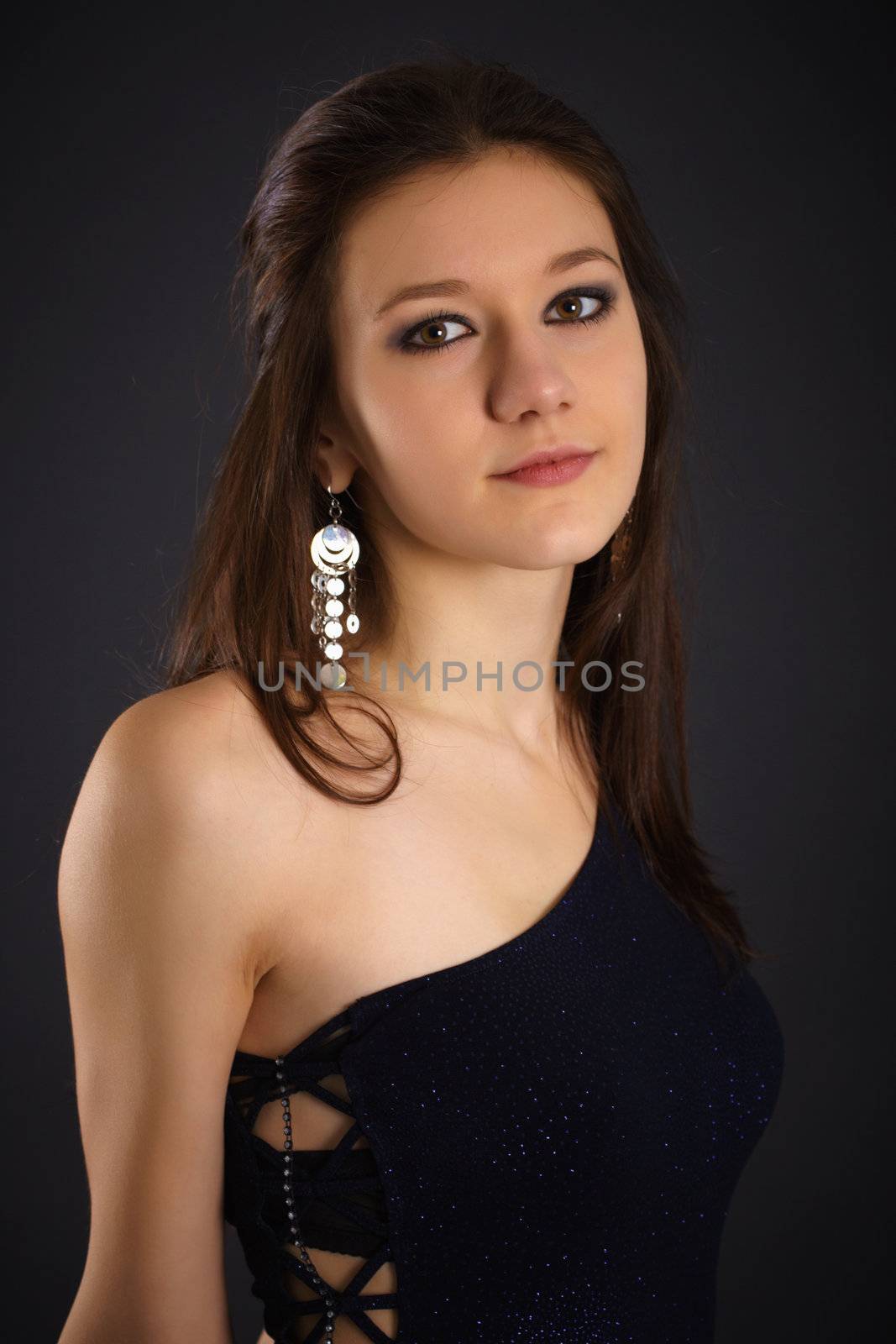 Portrait of young woman in blue dress by pzaxe