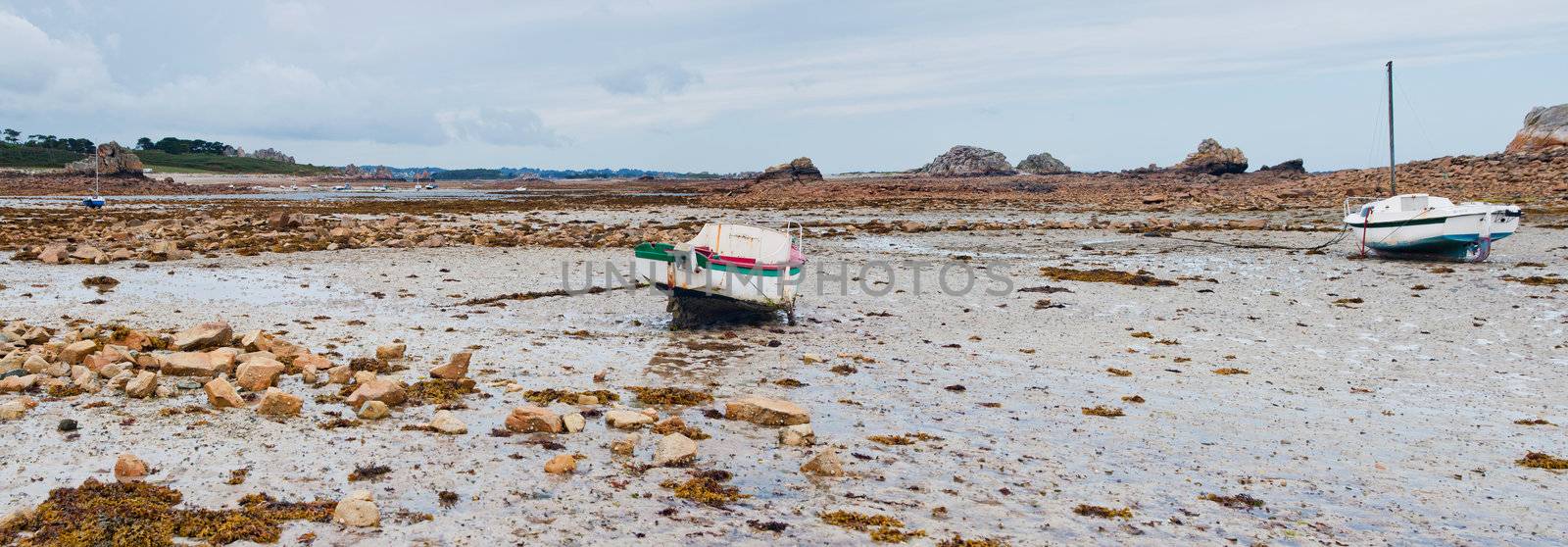 Rowboat at low tide cote Rose by maxoliki