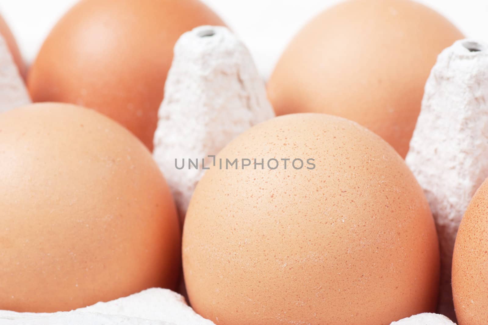 Eggs in carton. Nutritious eating.