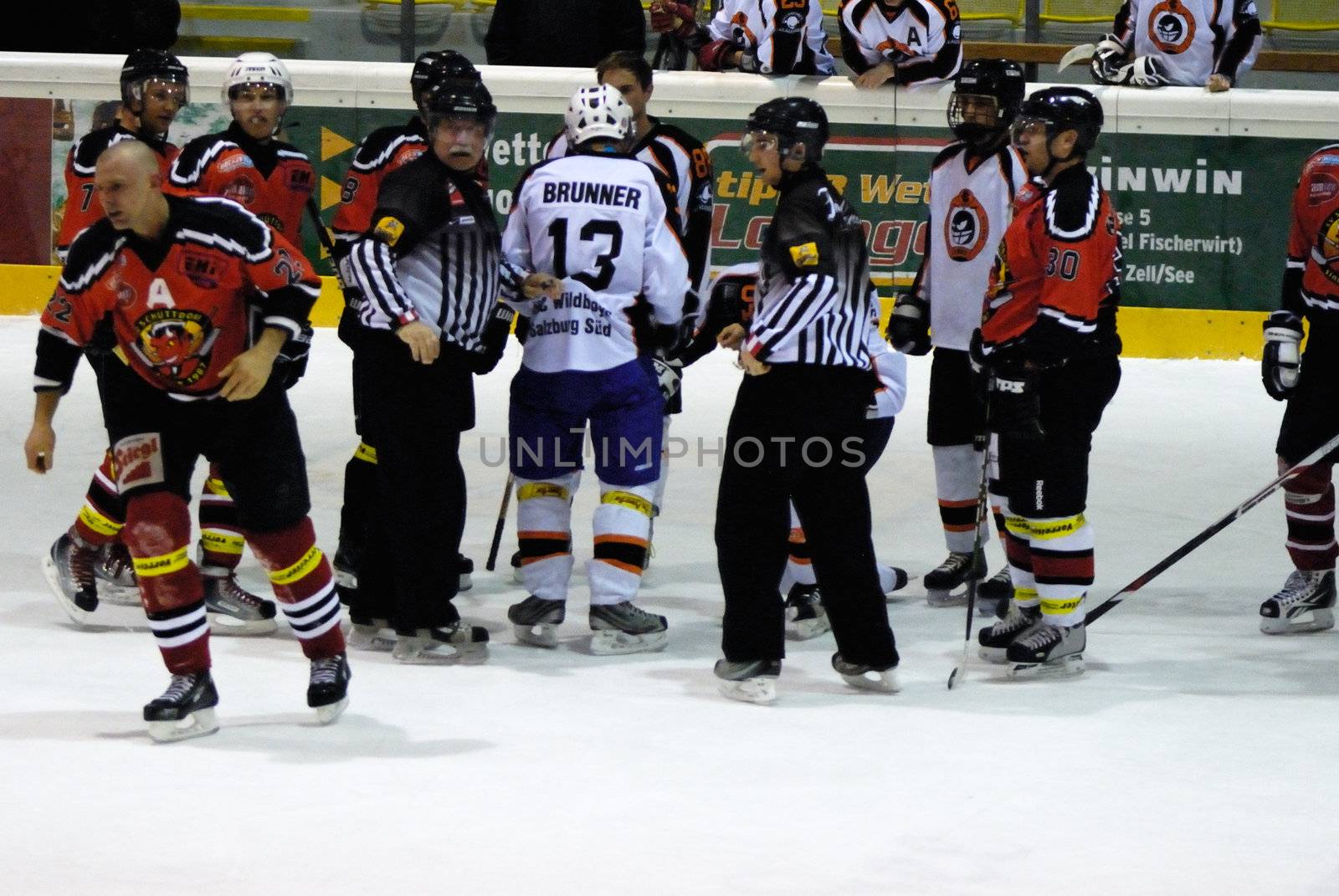 ZELL AM SEE, AUSTRIA - MARCH 19: Salzburg hockey League. Fight between Markus Ralser and Salzburg player. Game SV Schuettdorf vs Salzburg Sued  (Result 10-4) on March 19, 2011, at the hockey rink of Zell am See.