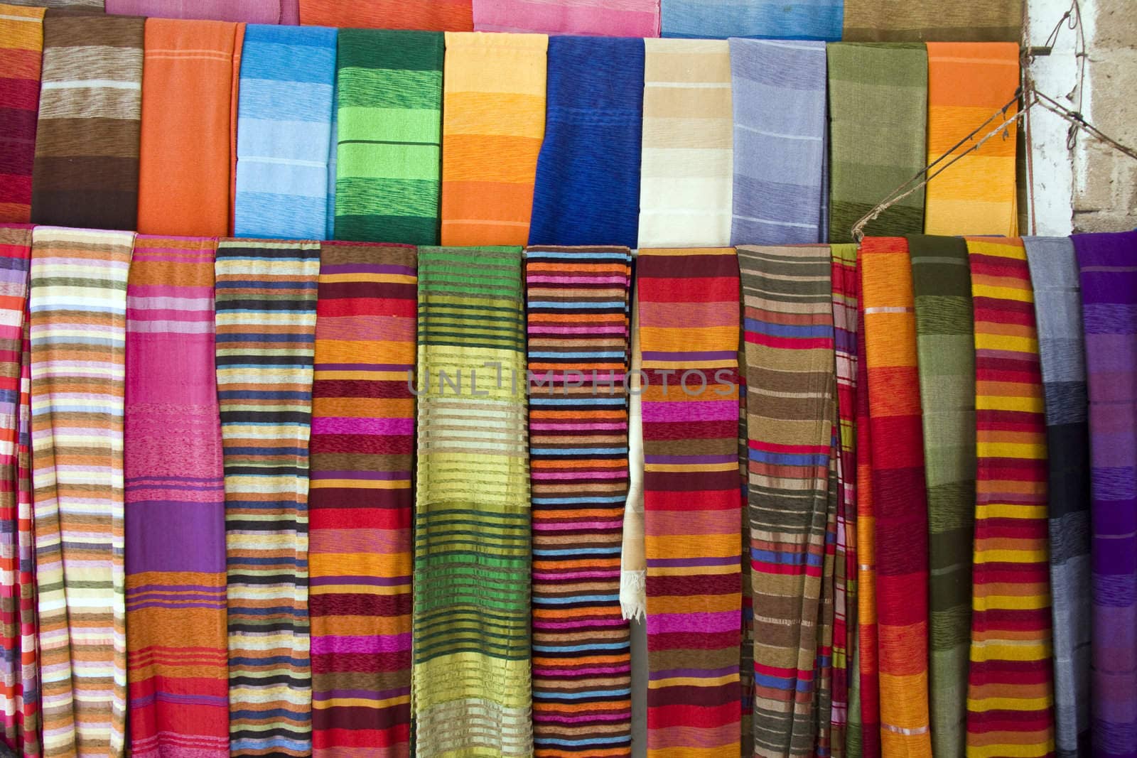 Cloth hanging outside a shop in Essaouira, Morocco