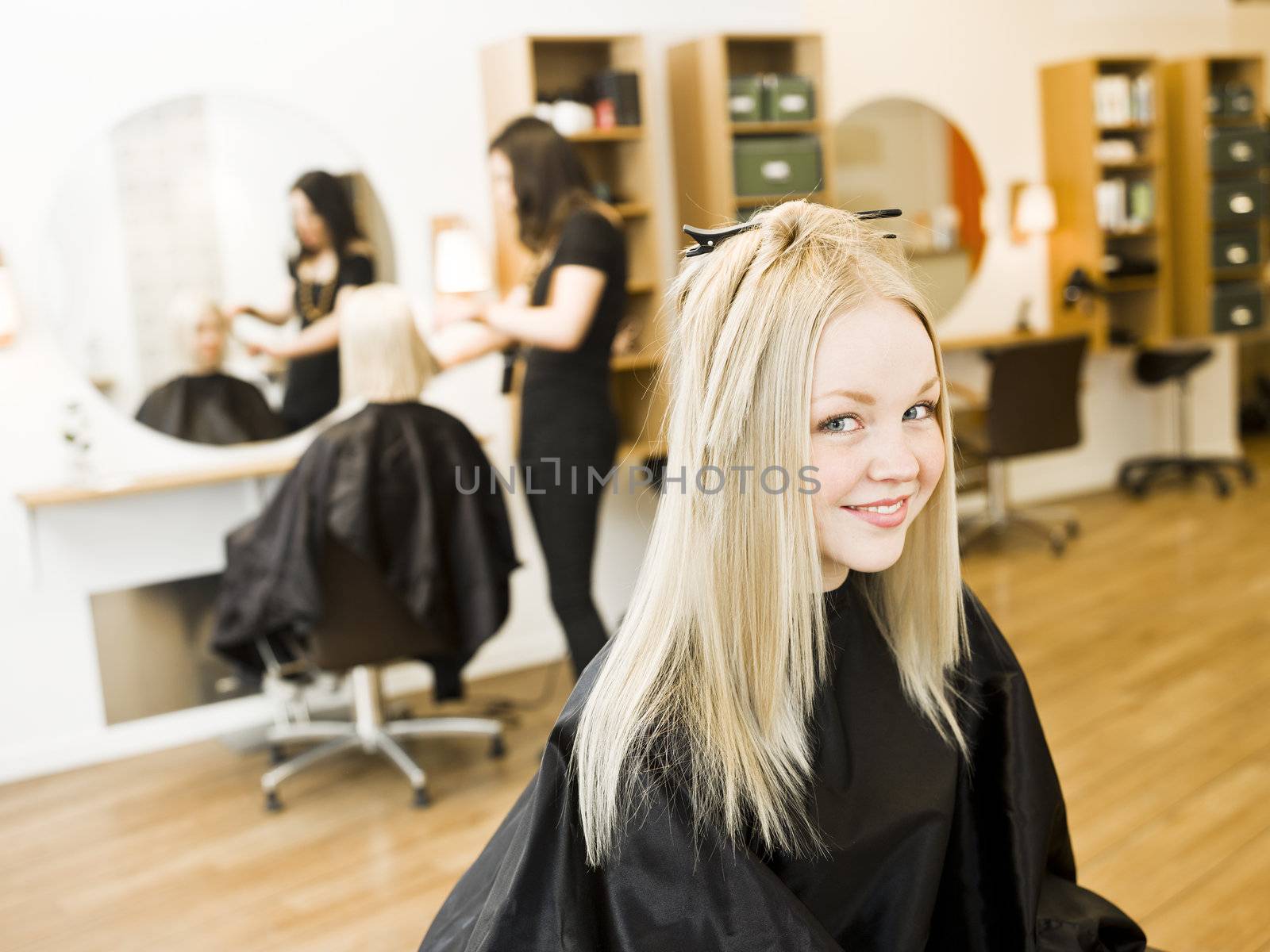 Young Blond Girl in the Hair Salon