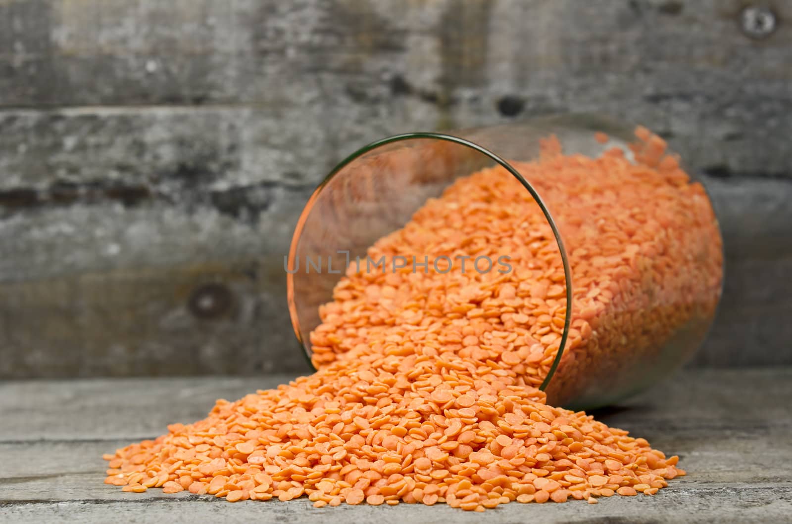 orange lentils iin a glass jar