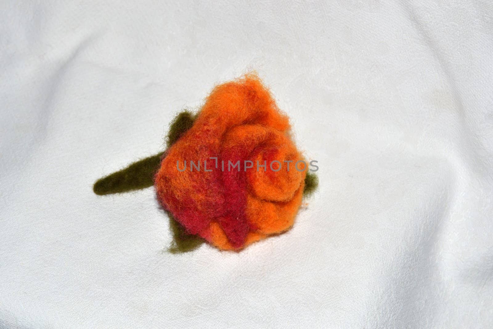 handmade woolen product with floral motif by dengess