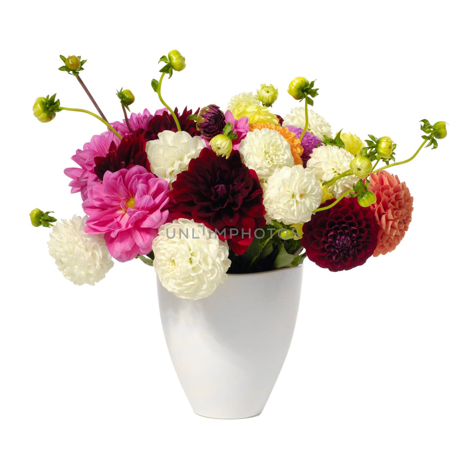 Bouquet of mixed flowers in vase taken on a white background