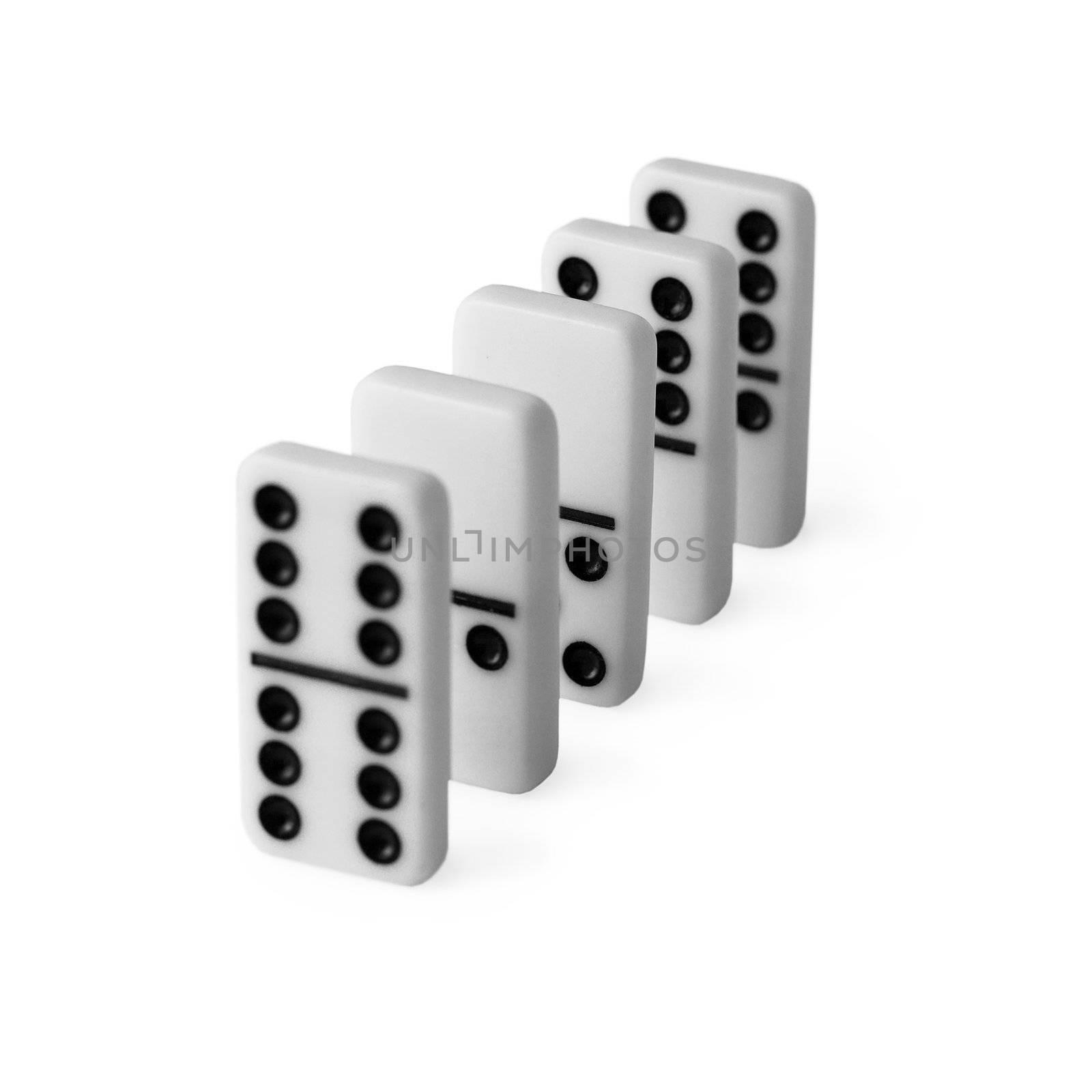 Dominoes set in row on white background by pzaxe