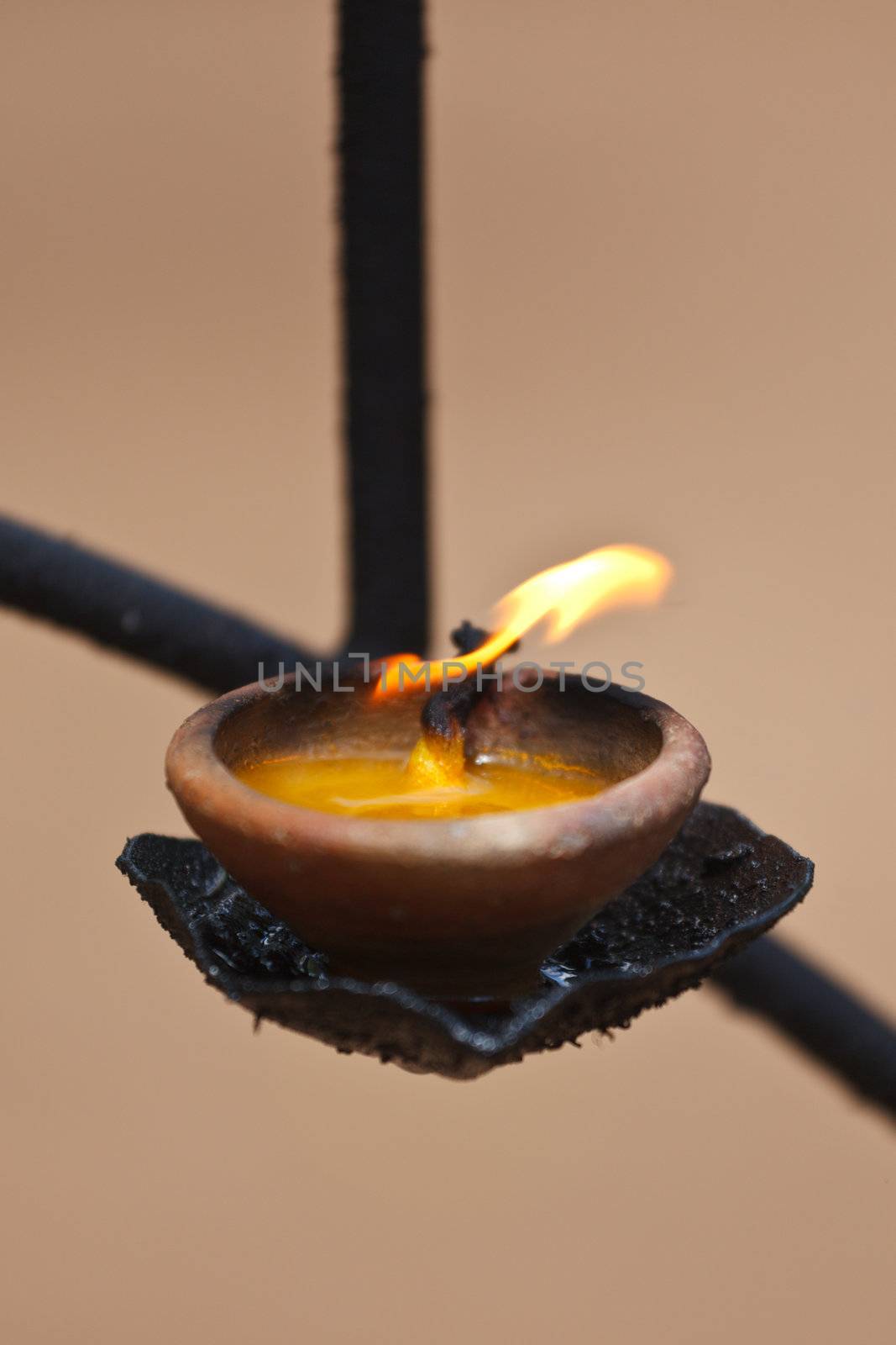 Burning lampion in Buddhist temple. Sri Lanka