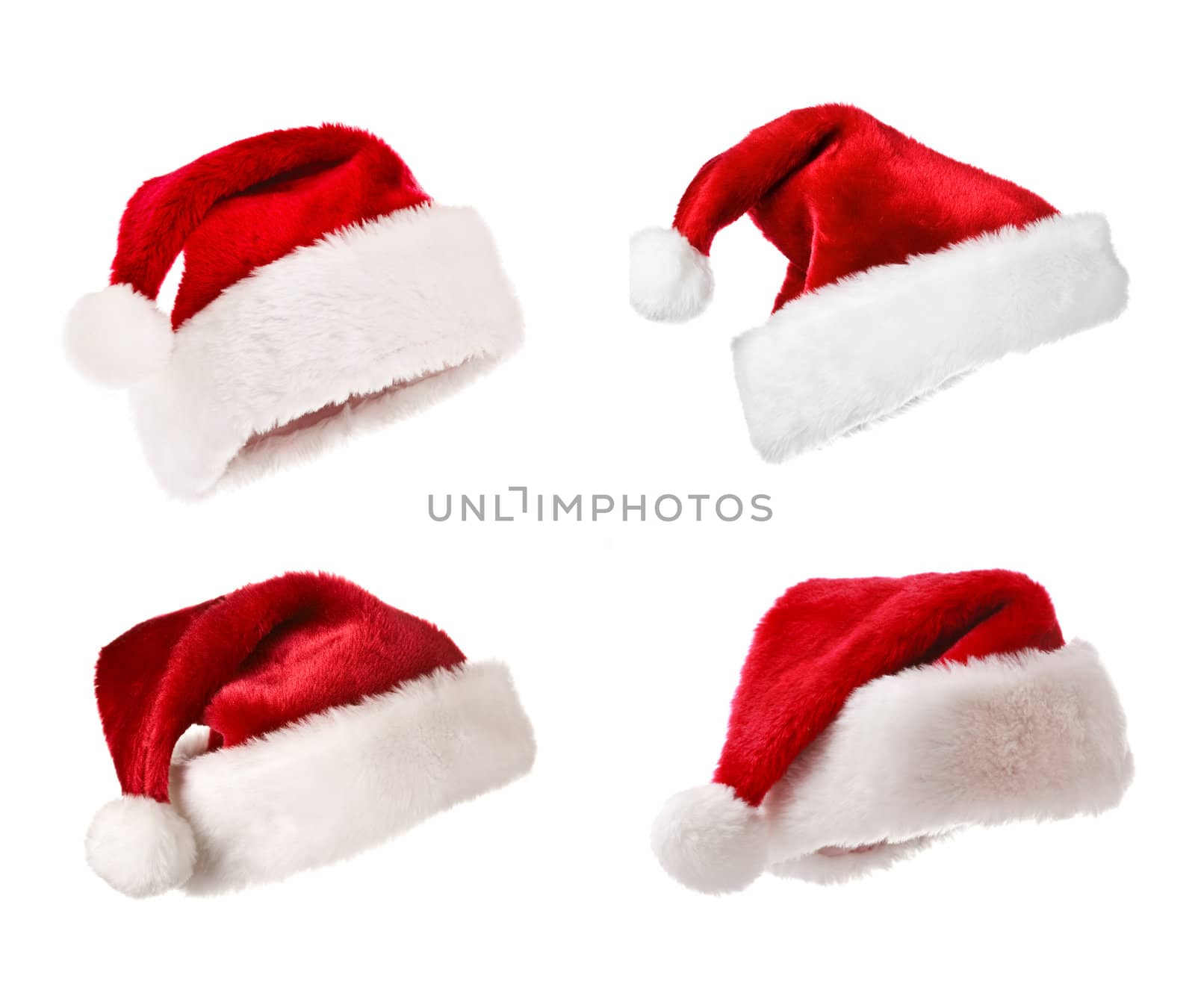 Santa hats isolated on white by dimol