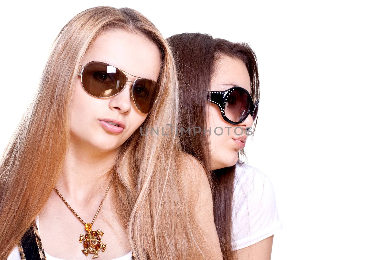 two beautiful women in a suit on a white background isolated