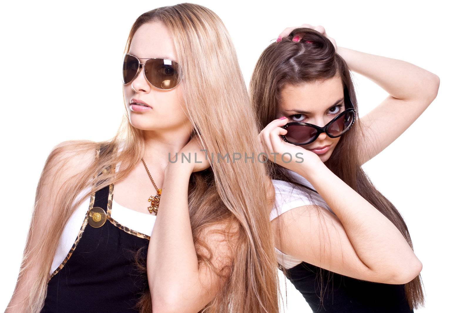 two beautiful women in a suit on a white background isolated