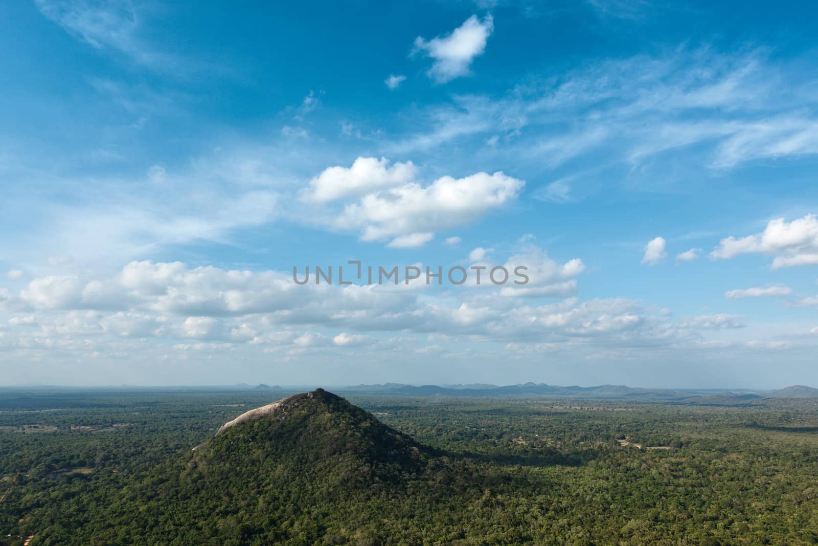 Sky above small mountains, covered with trees. Sri Lanka