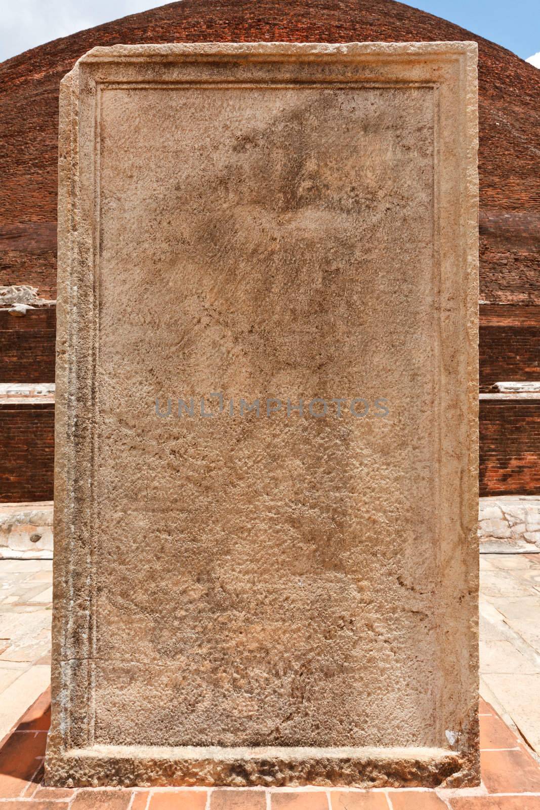 Stone tablet with inscriptions at Jetavaranama dagoba  (stupa). Anuradhapura, Sri Lanka