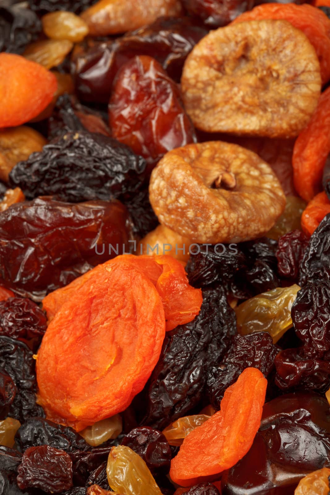 Various dried fruits (apricots, dates, raisins, figs) close-up