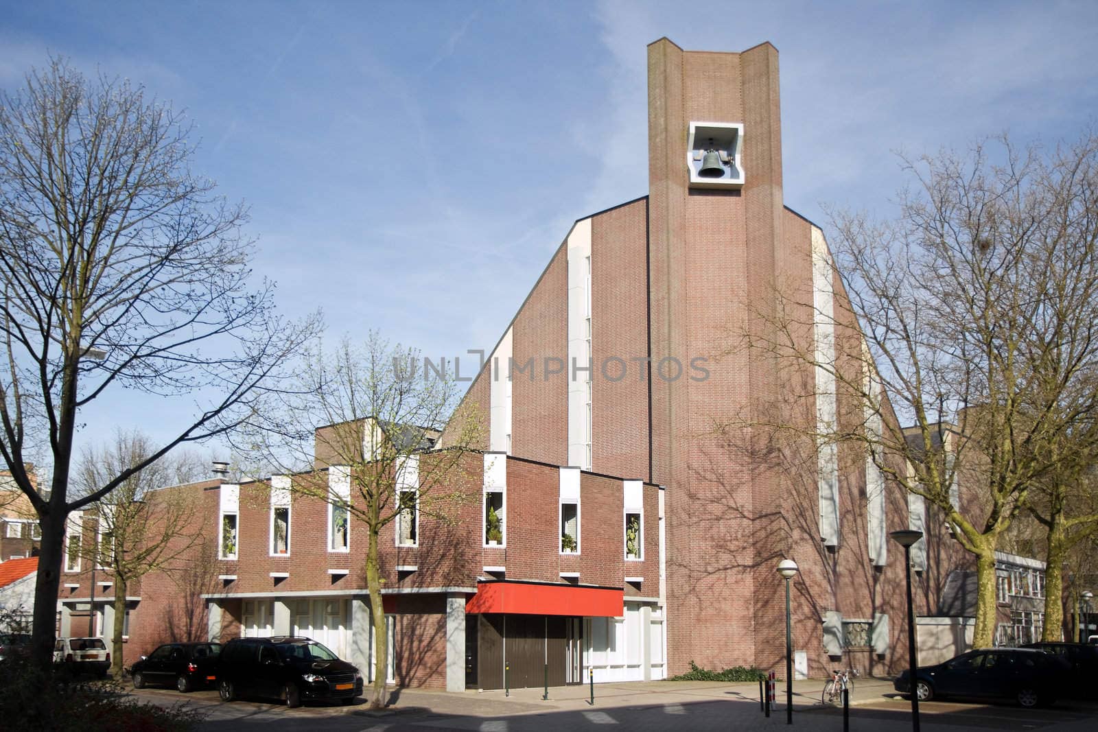 Streetview with modern church on day in early spring - christian house of worship