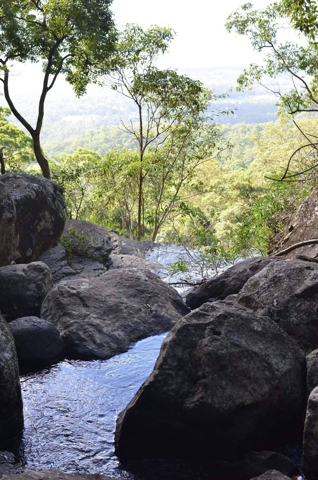 The top of Cameron Falls in the Mt Tamborine National Park. In the background is the Beaudesert district of south east Queensland.