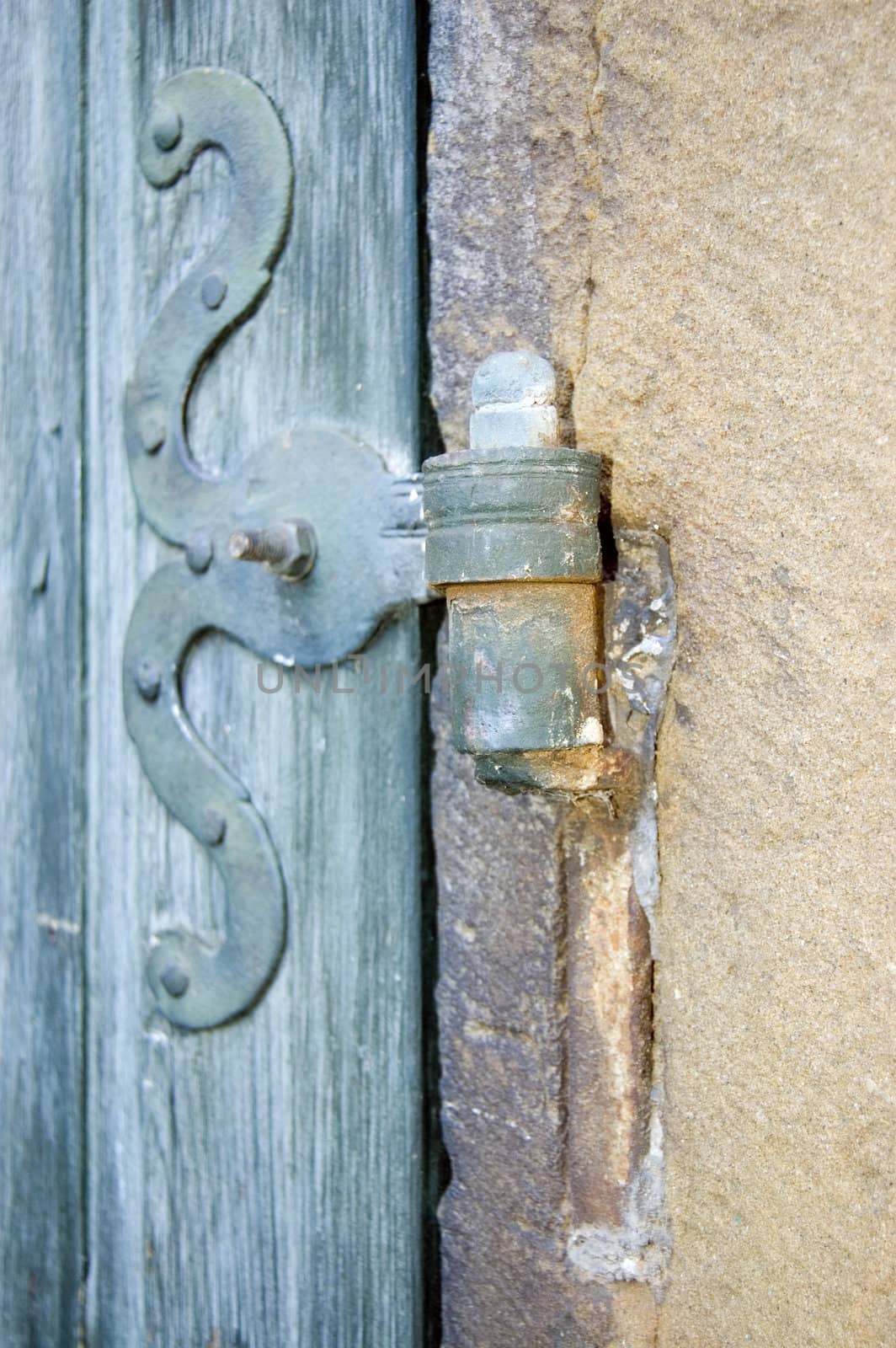Old wrought iron door hinge