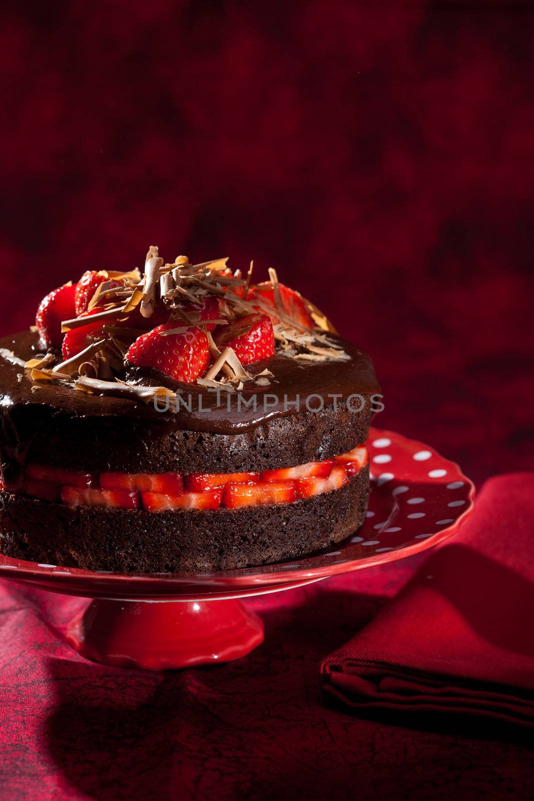 Delicious chocolate strawberry cake with chocolate ganache