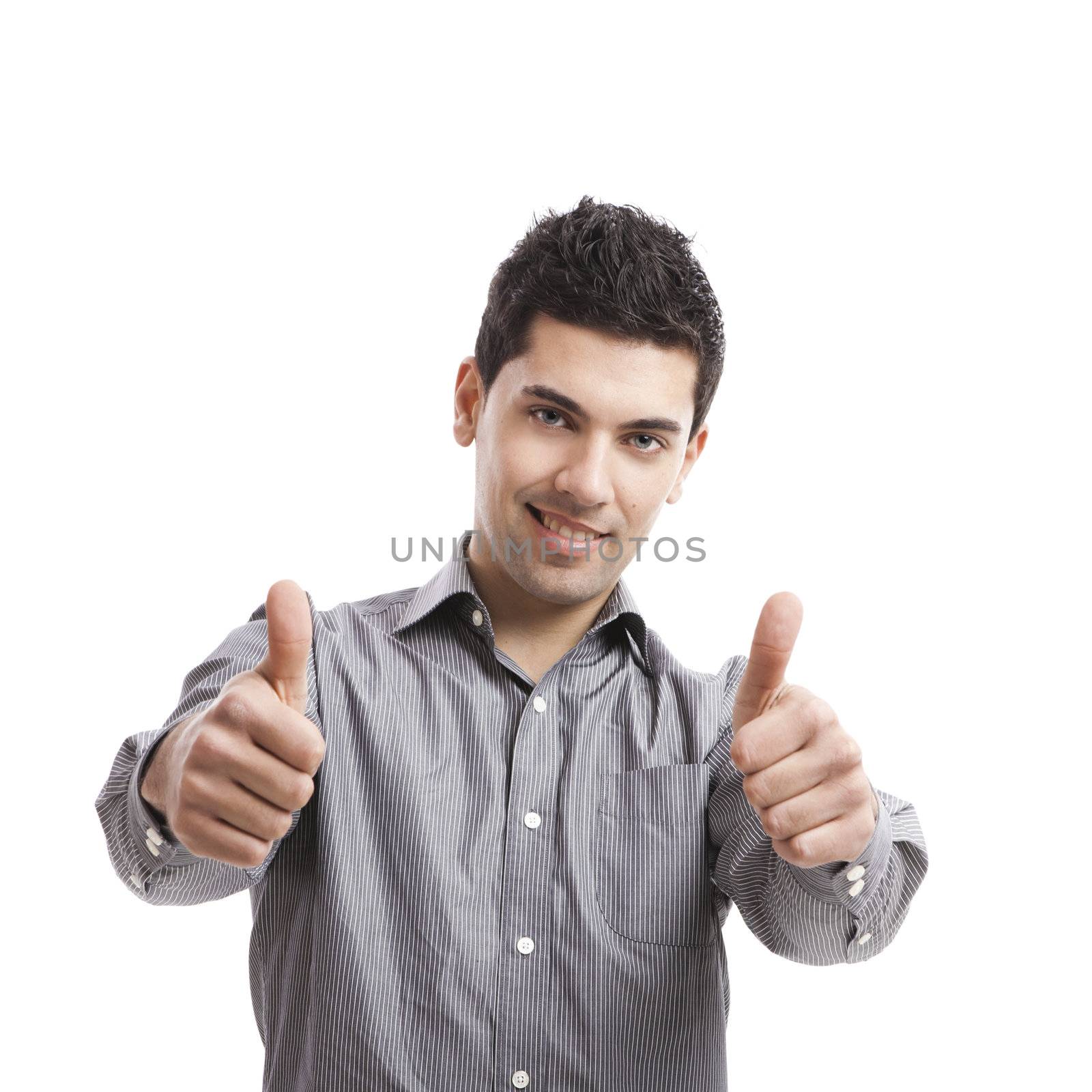 Handsome young man with thumbs up on an isolated white background 