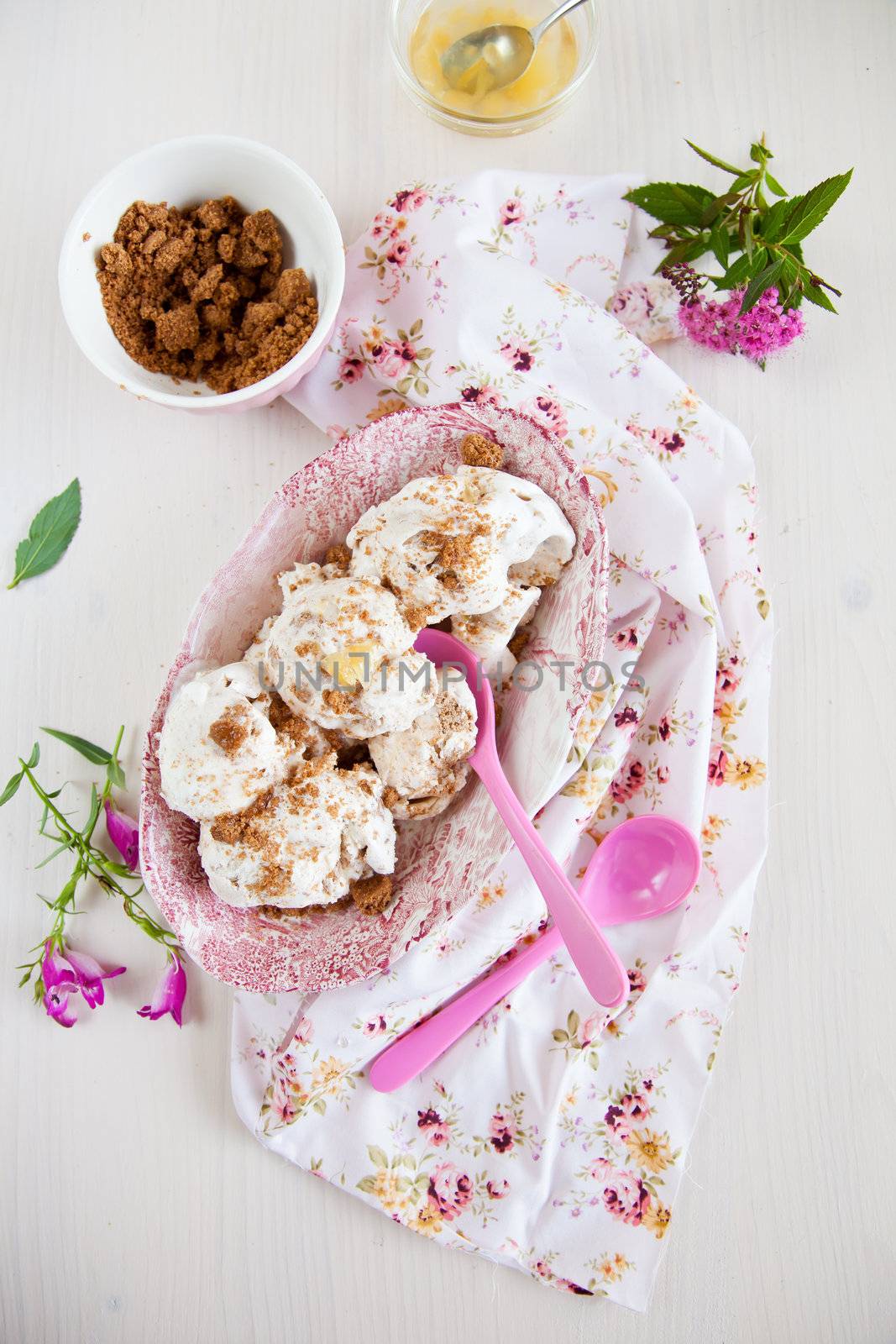 Delicious vanilla ice-cream with ginger cookies and stem ginger