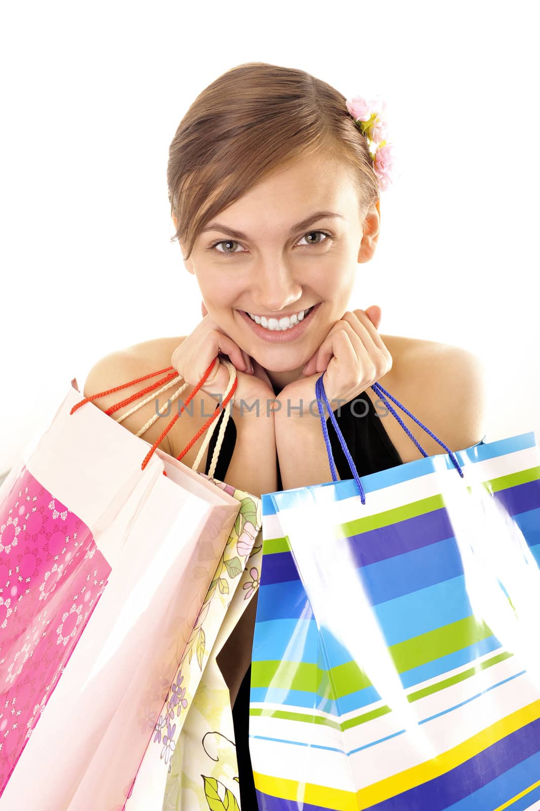 Beautiful young woman being happy with her shopping