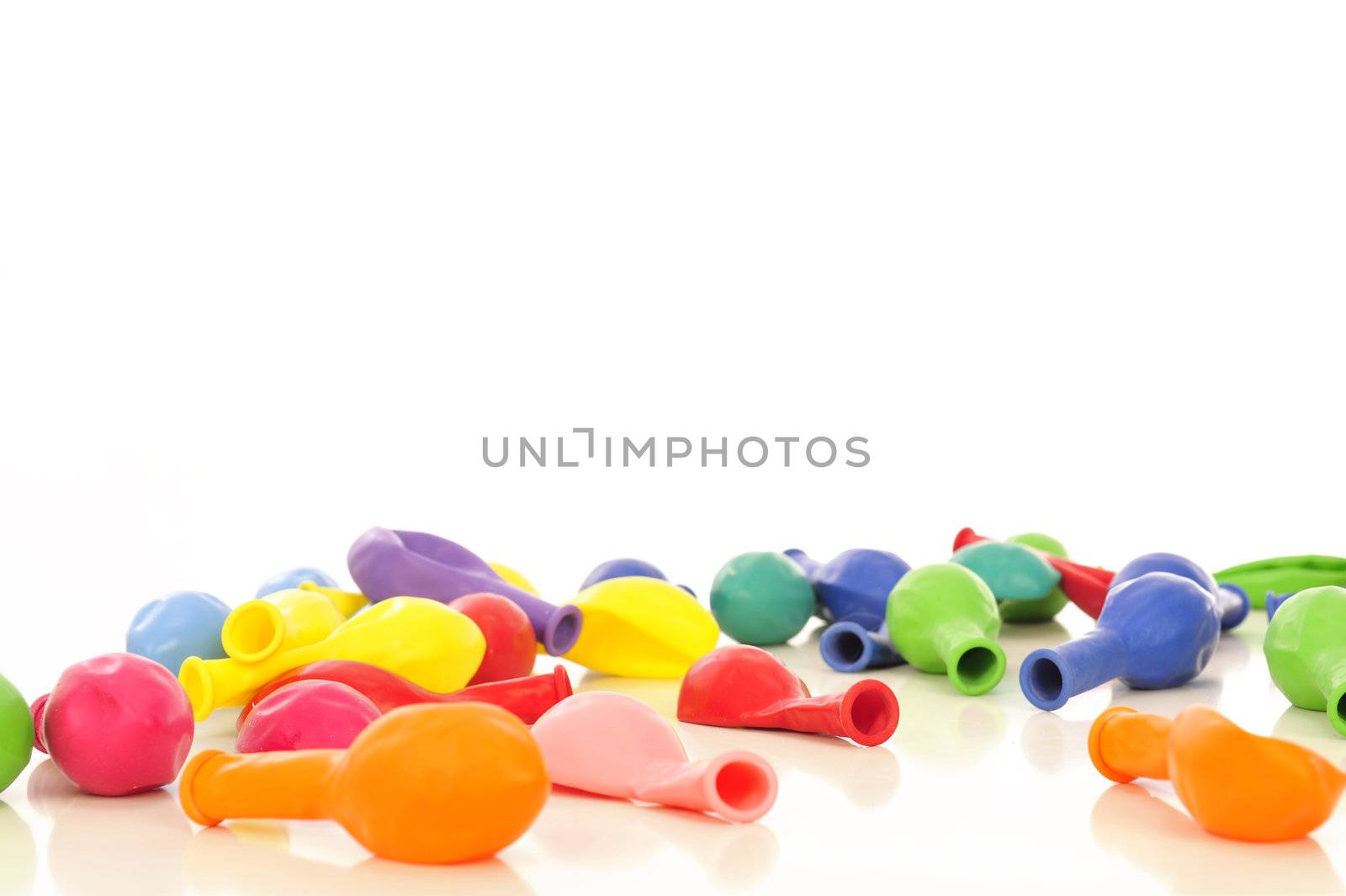  Colourful empty balloons over a white background