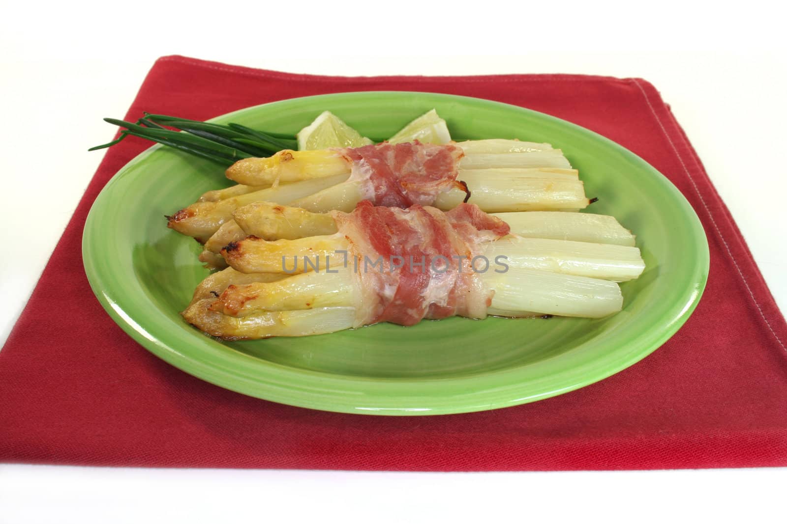 Asparagus in bacon coat by silencefoto