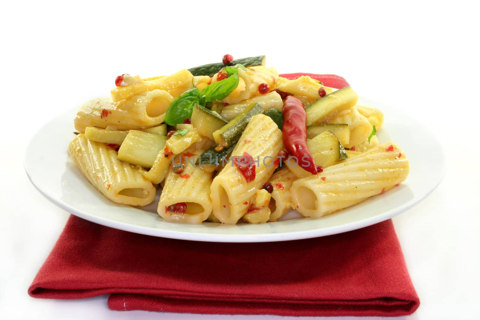 Tortiglione with fiery chili zucchini by silencefoto