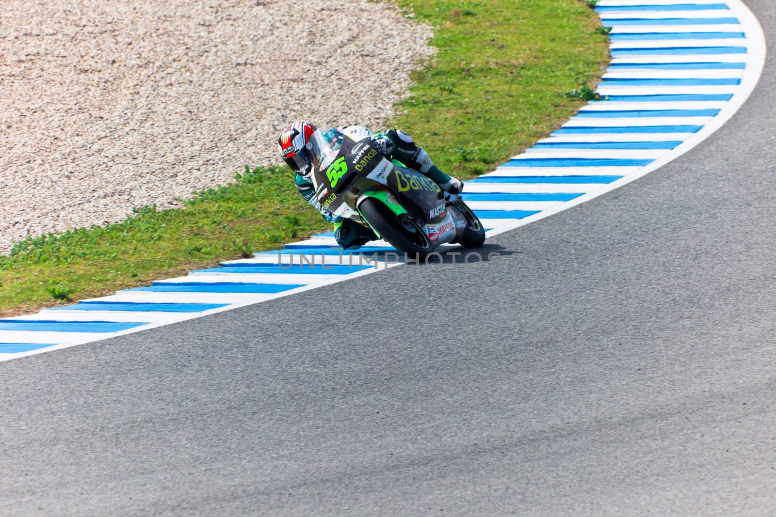 JEREZ DE LA FRONTERA, SPAIN - MAR 5: Moto2 motorcyclist Hector Faubel takes a curve in the MotoGP Official Trainnig on Mar 5, 2011 in Jerez de la Frontera, Spain