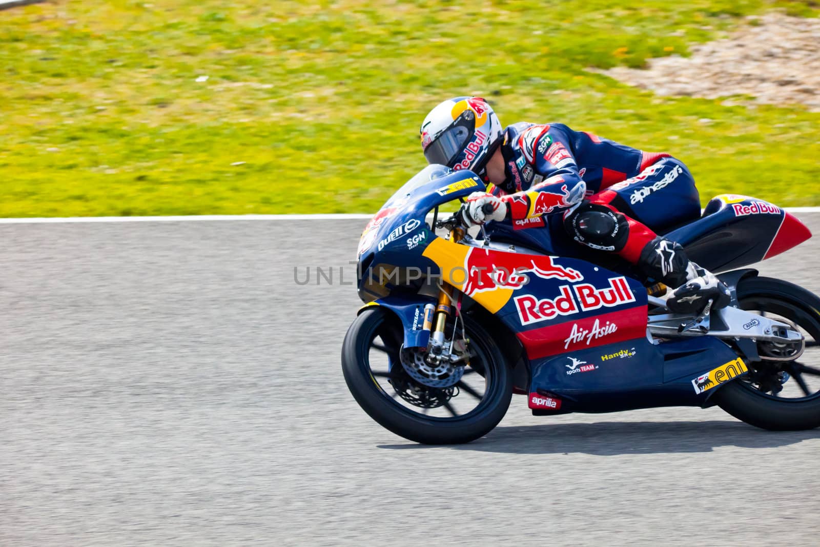 JEREZ DE LA FRONTERA, SPAIN - MAR 5:125cc pilot Jonas Folger races on the official training of the world championship of MotoGP on Mar 5, 2011, in Jerez de la Frontera, Spain