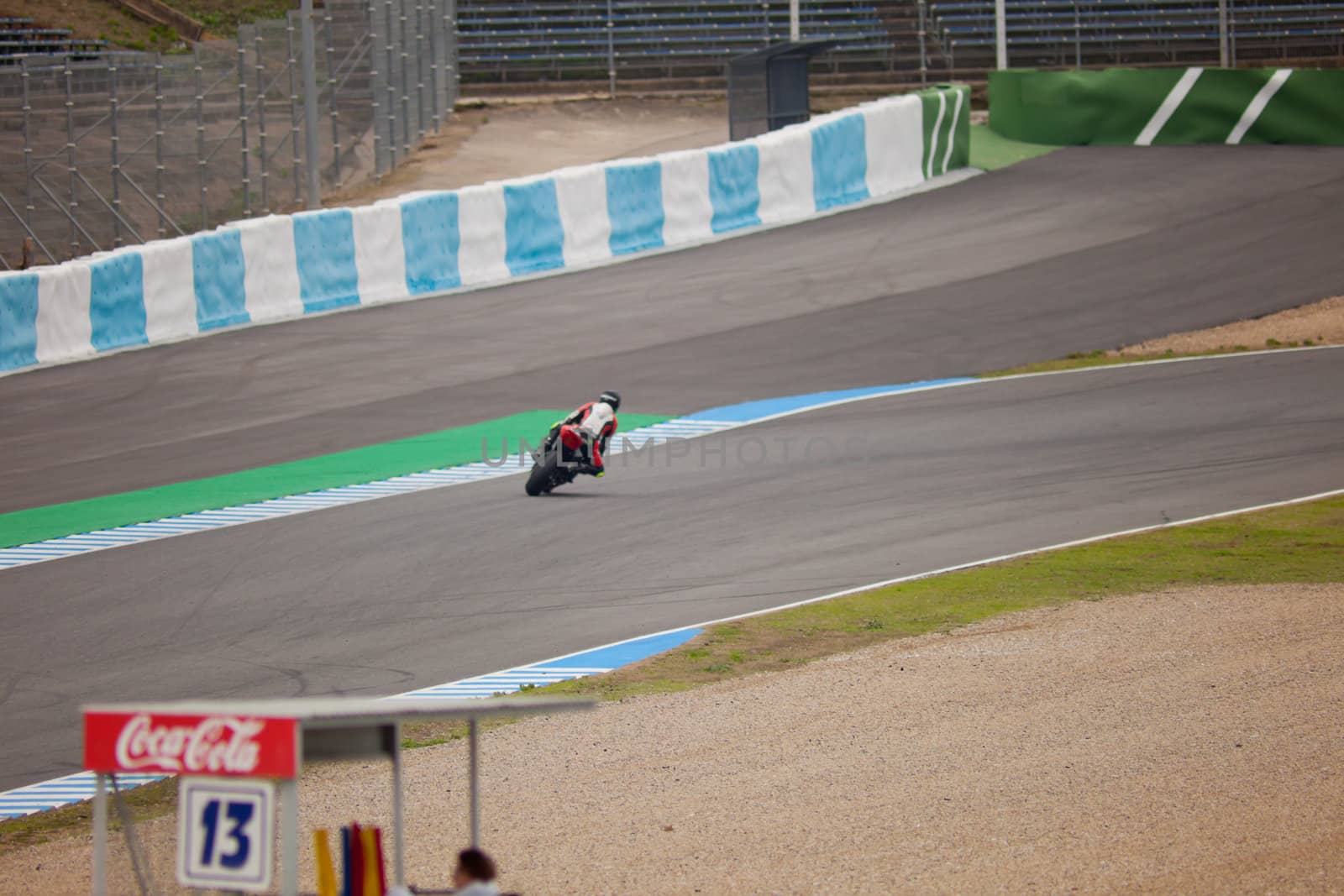 JEREZ DE LA FRONTERA, SPAIN - NOV 20: Stock Extreme motorcyclist Didac Fernandez takes a curve in the CEV championship on Nov 20, 2010, in Jerez de la Frontera, Spain