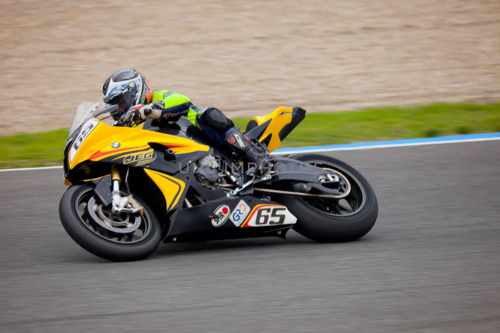 JEREZ DE LA FRONTERA, SPAIN - NOV 20: Stock Extreme motorcyclist Juan Gomez takes a curve in the CEV championship on Nov 20, 2010, in Jerez de la Frontera, Spain