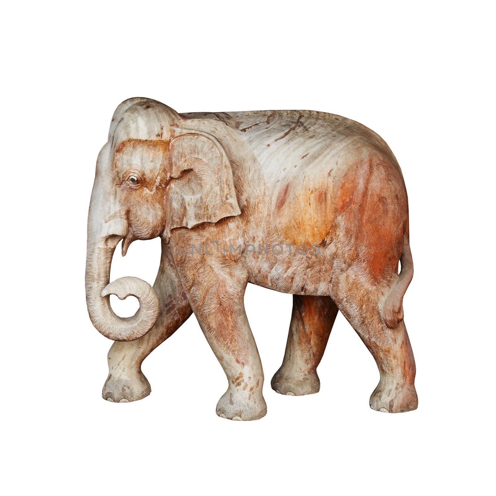 A large wooden sculpture - elephant walking on white