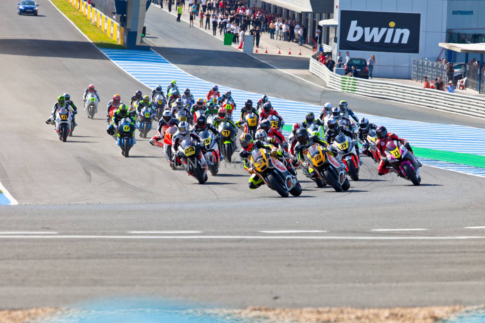 JEREZ DE LA FRONTERA, SPAIN - APR 17: Motorbike competitors begin the Moto2 race in the CEV Championship on April 17, 2011 in Jerez de la Frontera, Spain.