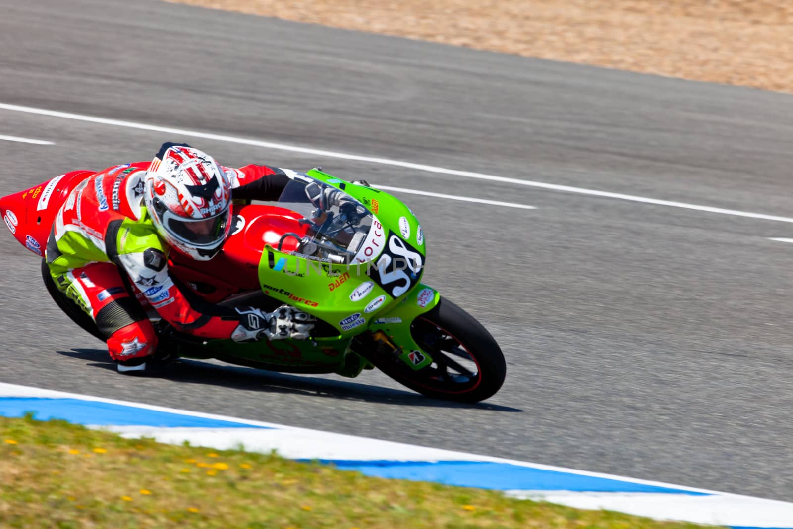 JEREZ DE LA FRONTERA, SPAIN - APR 17: 125cc motorcyclist Juanfran Guevara takes a curve in the CEV Championship race on April 17, 2011 in Jerez de la Frontera, Spain.
