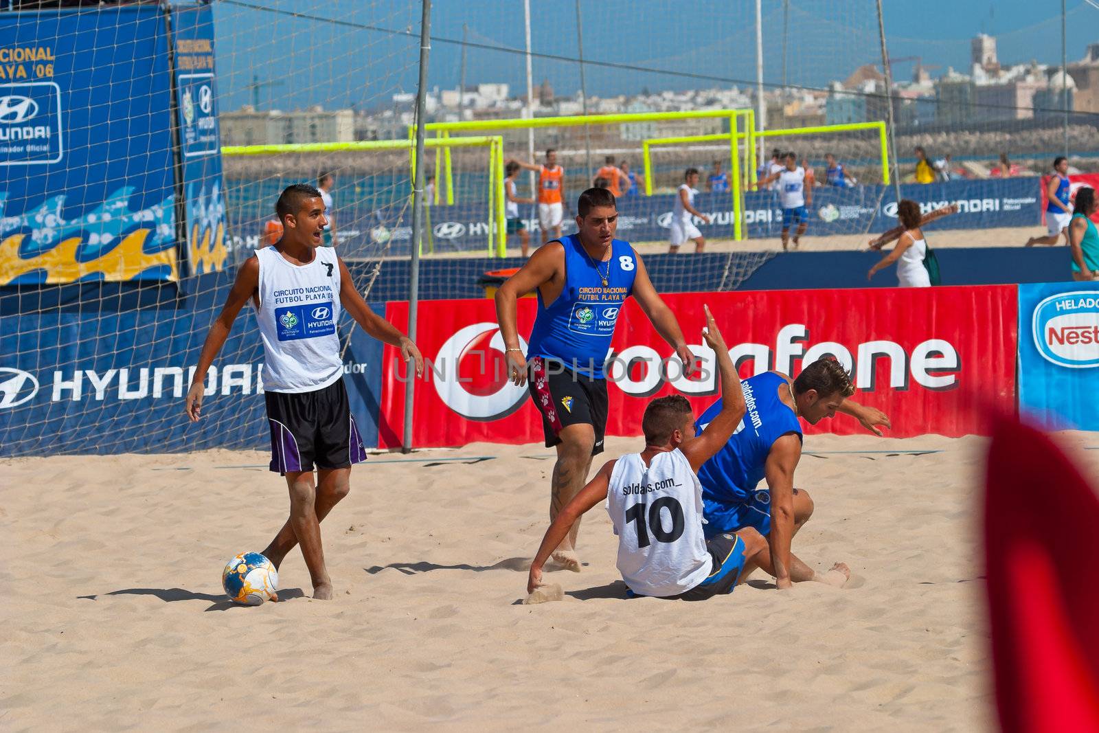 CADIZ, SPAIN -  JUL 22:  Unknown players of unknown team playing the Spanish Championship of Beach Soccer on Jul 22, 2006 on the beach of La Victoria in Cadiz, Spain