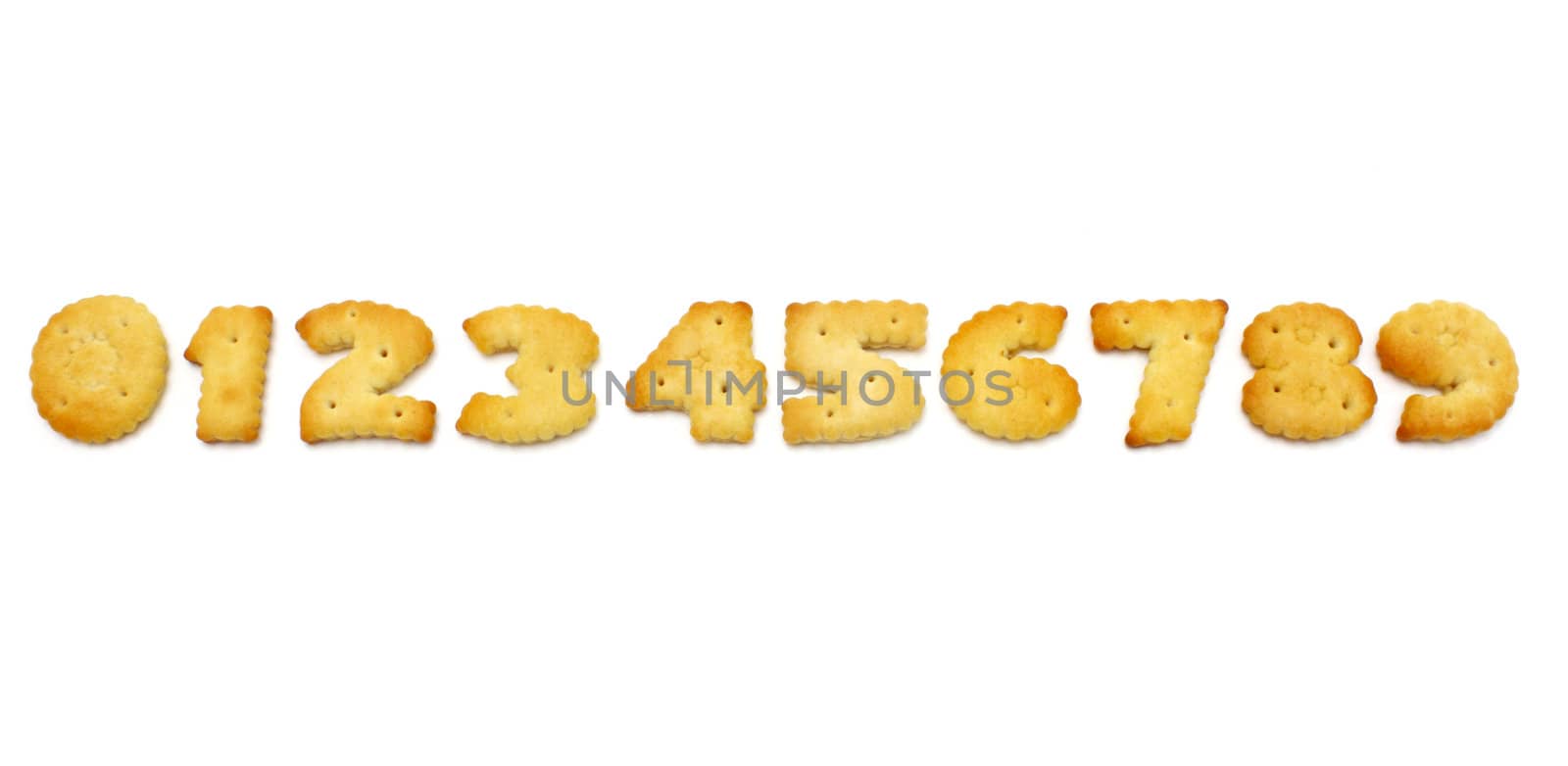 Yellow cookies in the form of figures on a white background