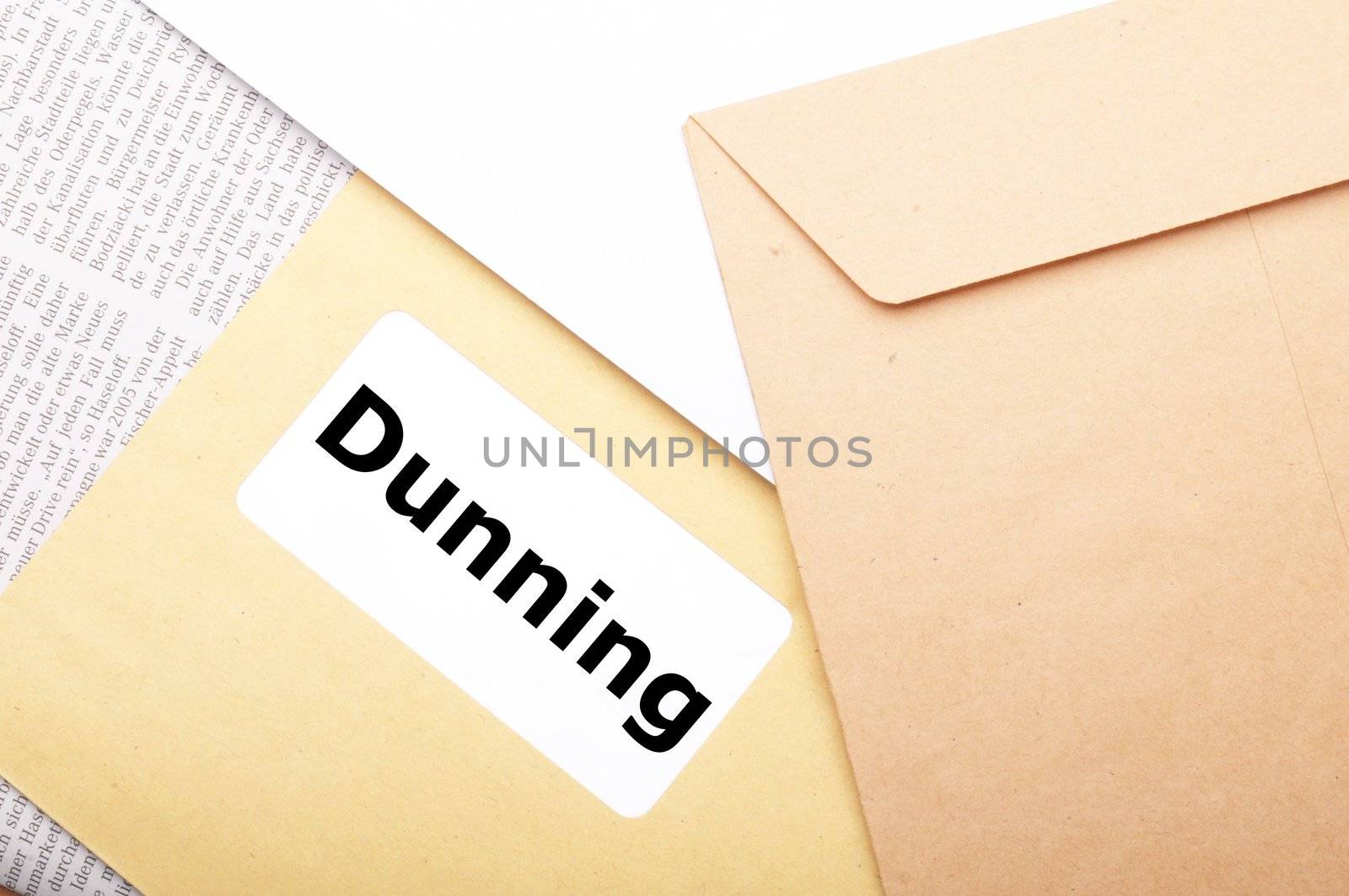 dunning or reminder concept with post letter and word