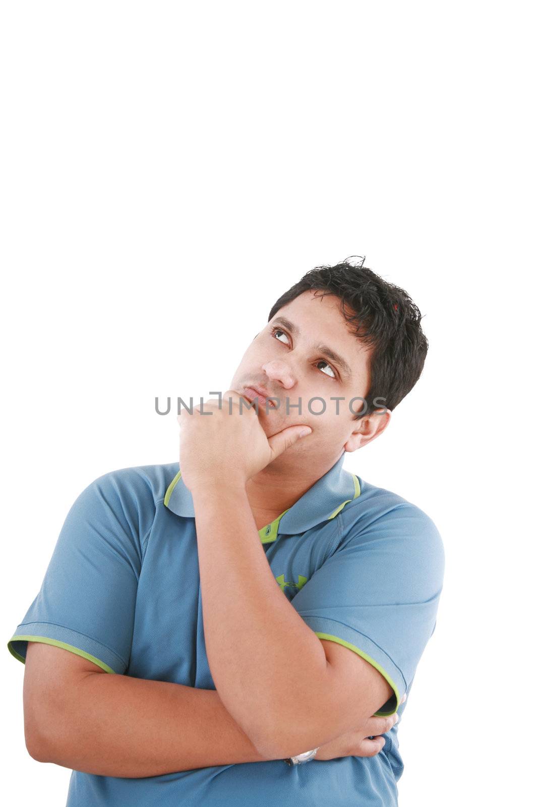 Thinking man isolated on white background. Closeup portrait of a casual young pensive businessman looking up at copyspace