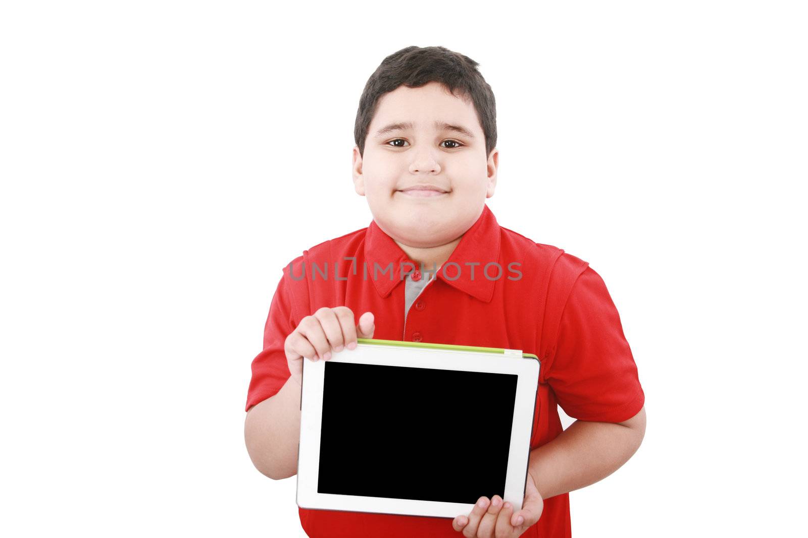 Young boy holding a tablet computer isolated on white