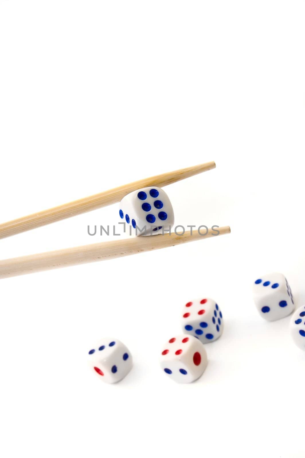 Chopsticks and dices on white background by rusak