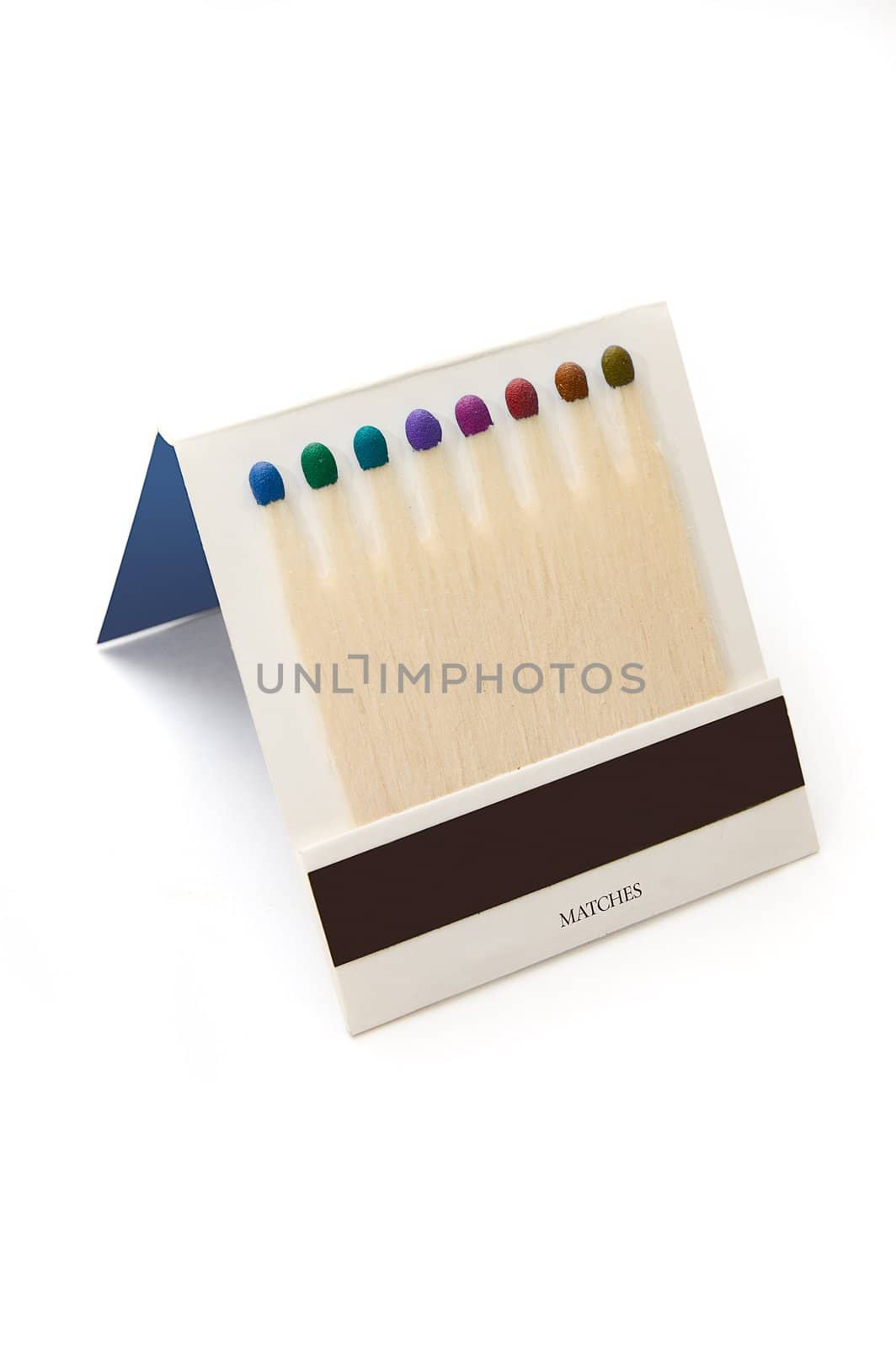 Many-coloured matches on white background