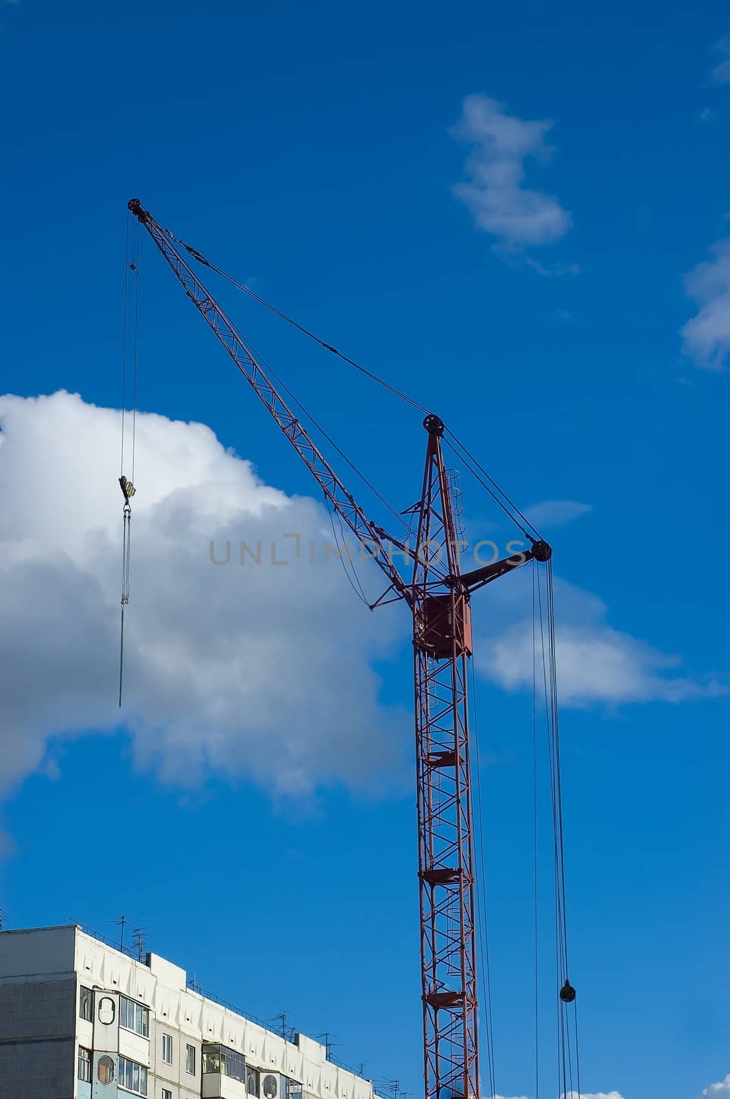 Tower crane at housing construction site
