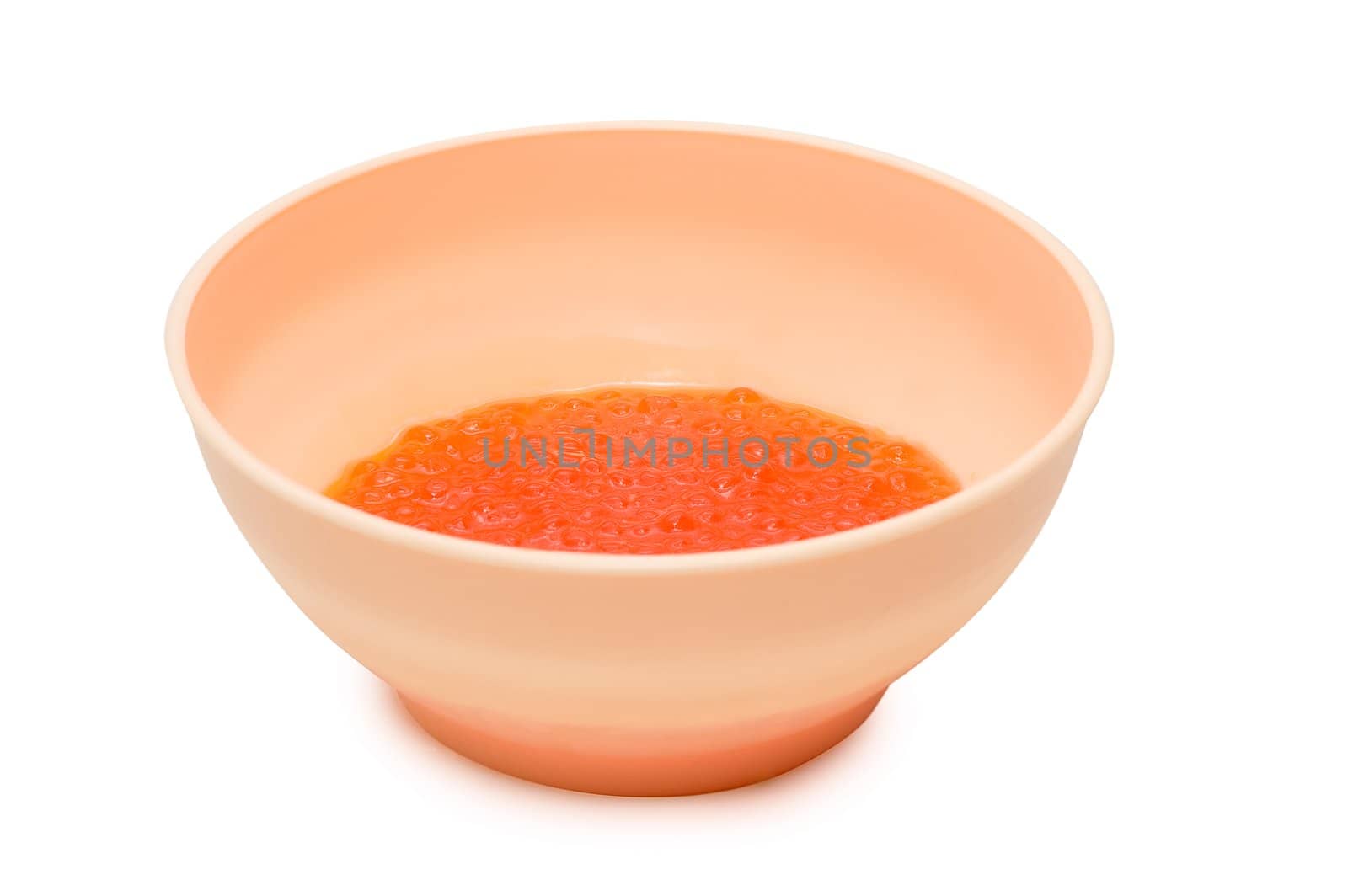 Red caviar in the  container. Isolation on white. 