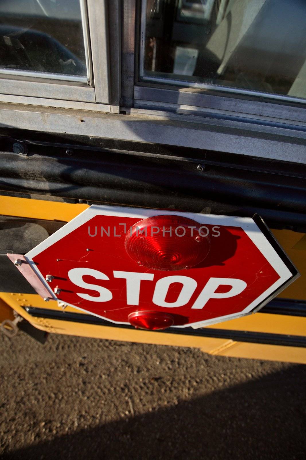 Stop sign on school bus in Saskatchewan by pictureguy