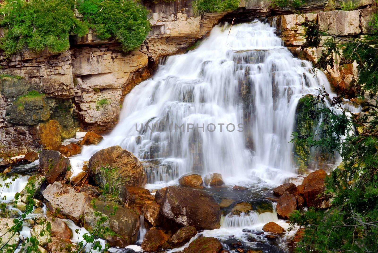 Cascading waterfall in wilderness in Ontario, Canada.