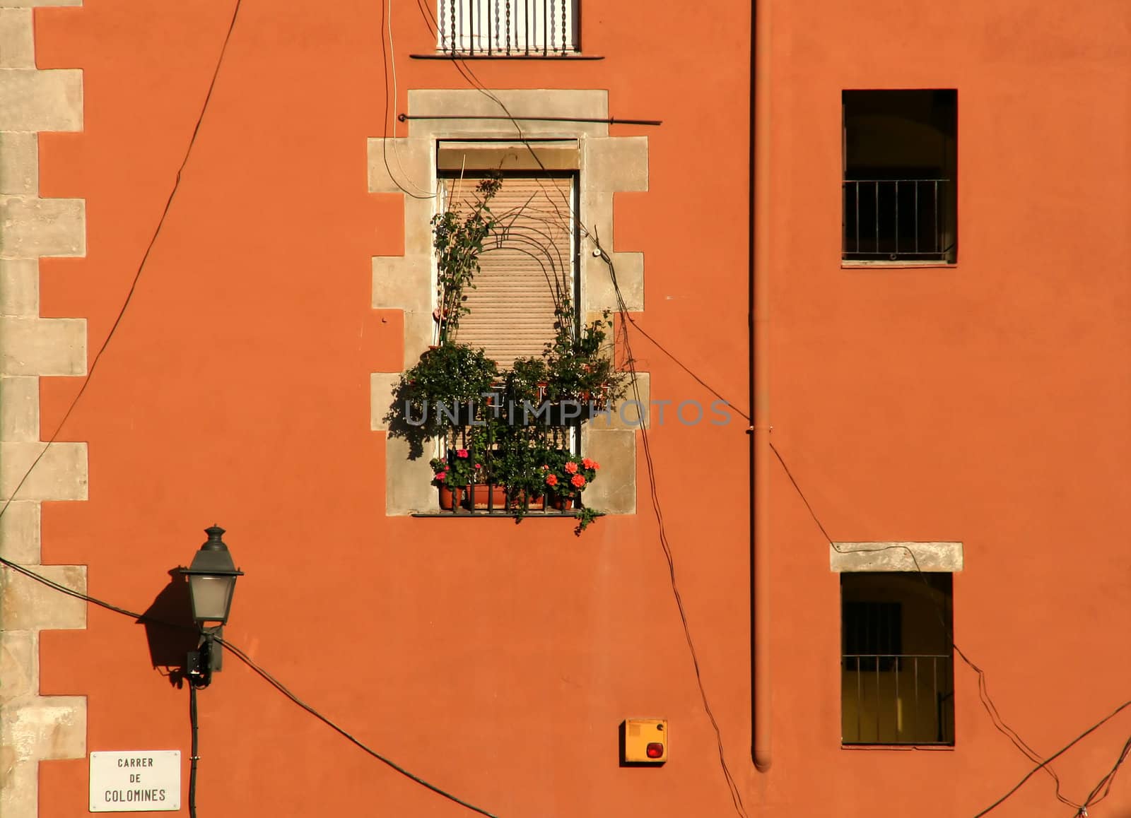 house facade in europe, mediterranean style, warm colors