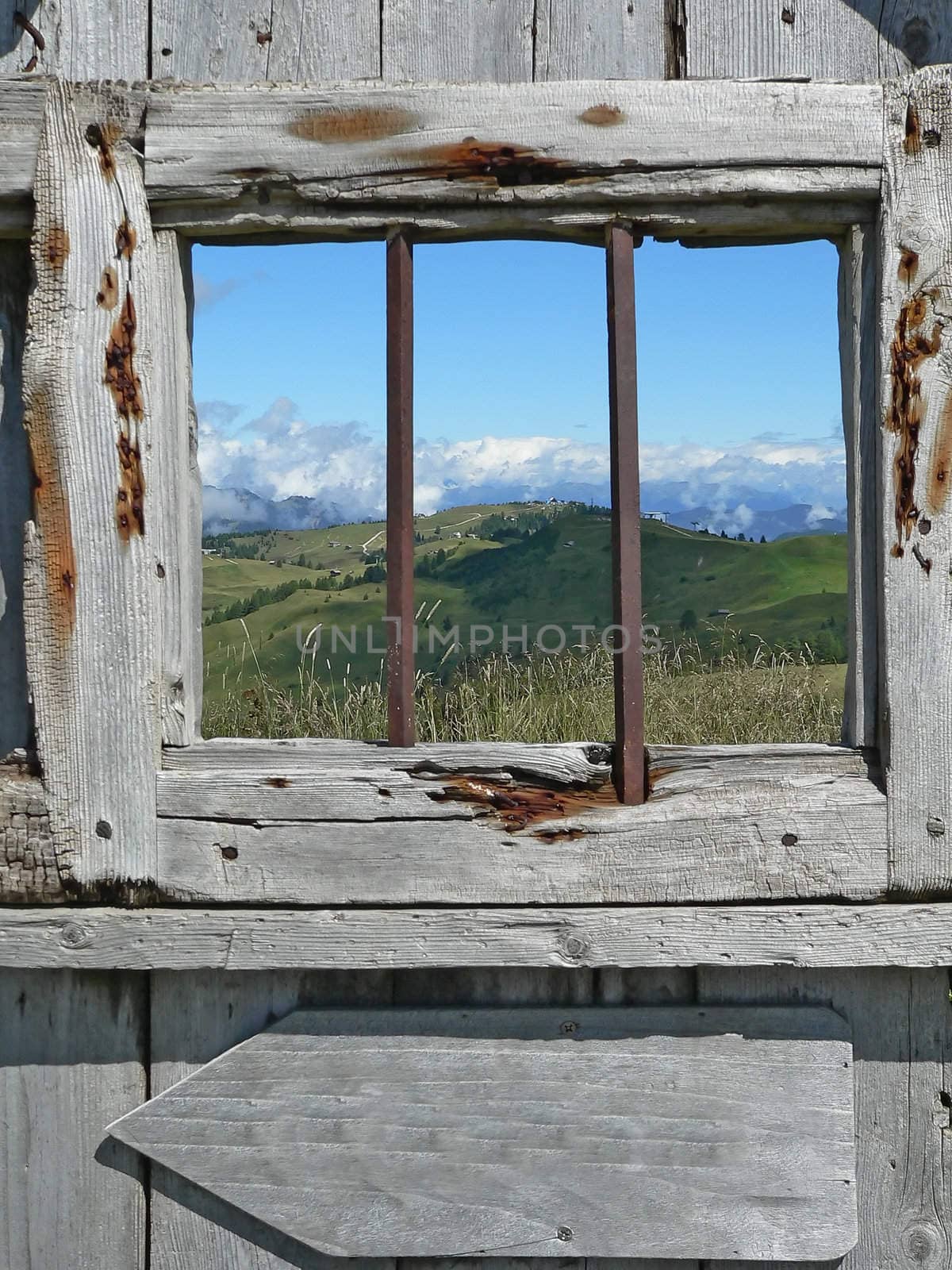 mountain landscape and  wood window 