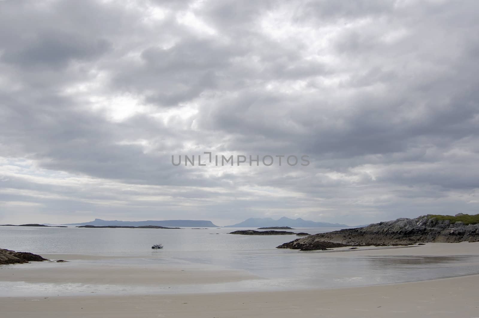 The islands of Eigg and Rum from the beach at Arisaig, Scotland where the film Local Hero was made.