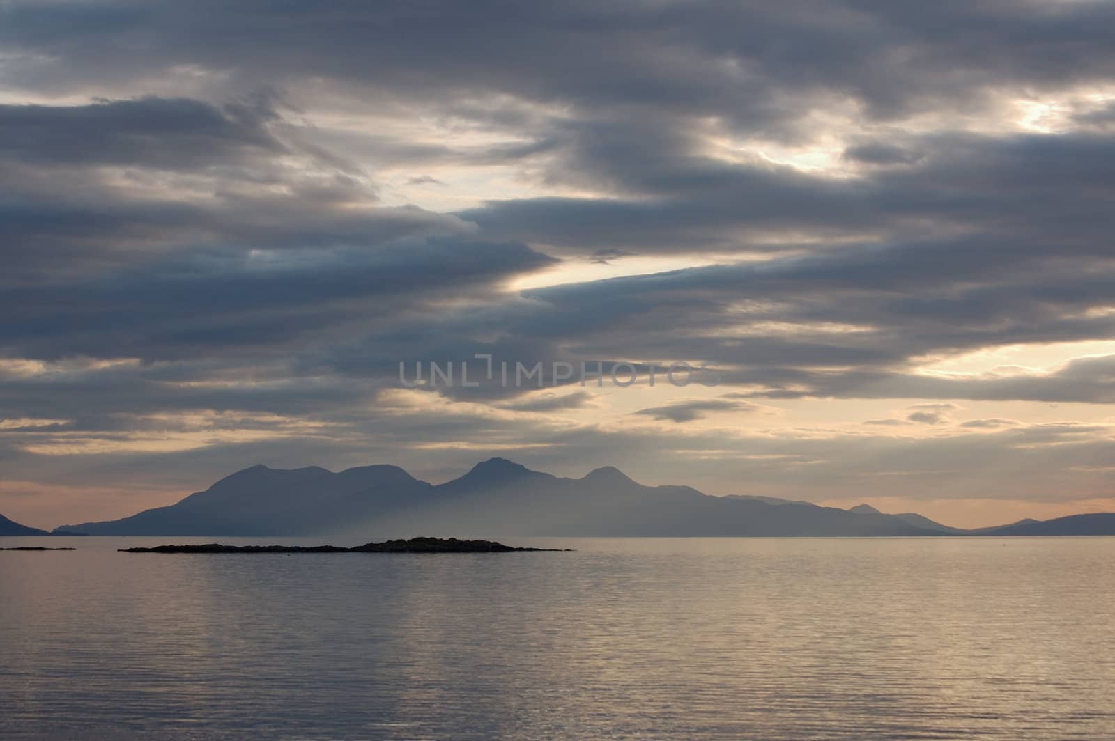 The island of Rum from Arisaig on the west coast of Scotland on a late evening in summer